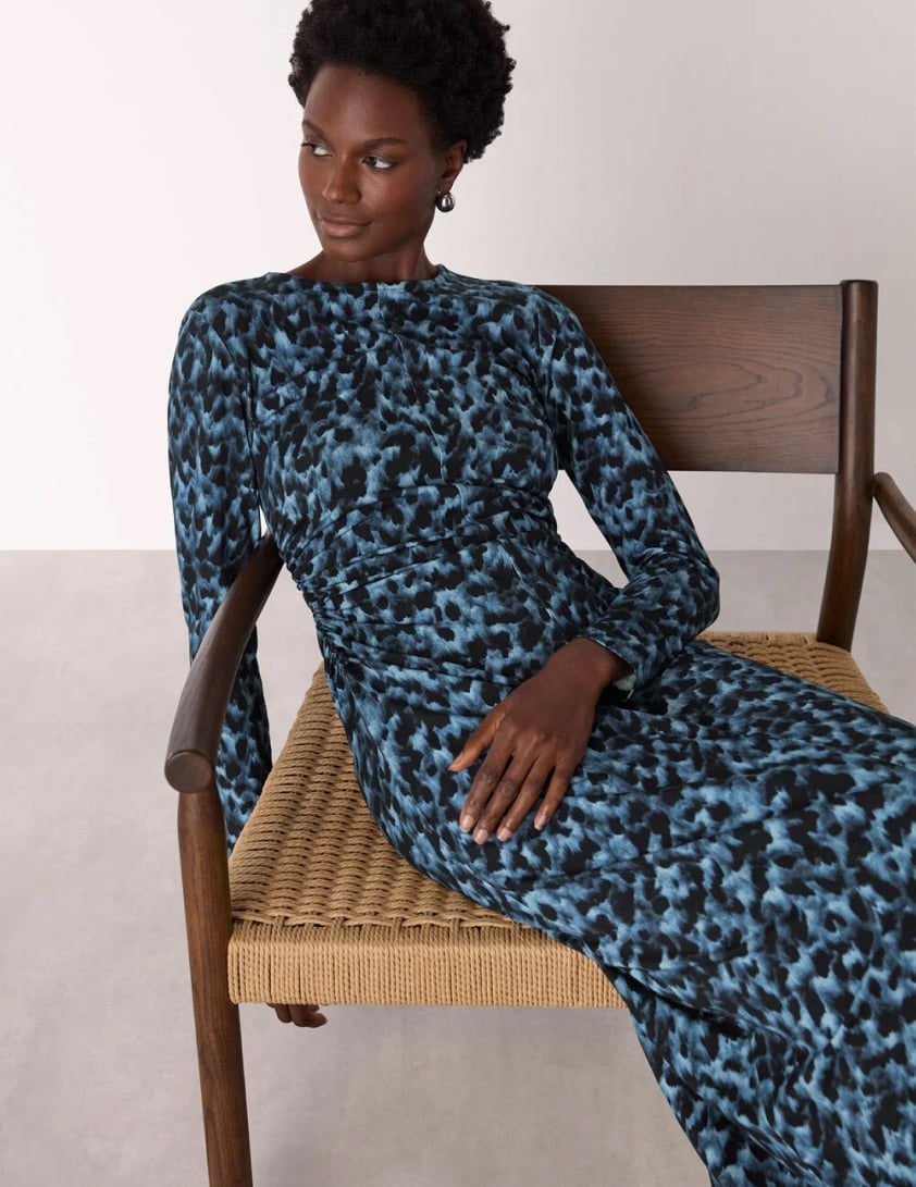 woman wearing funnel neck jumpers